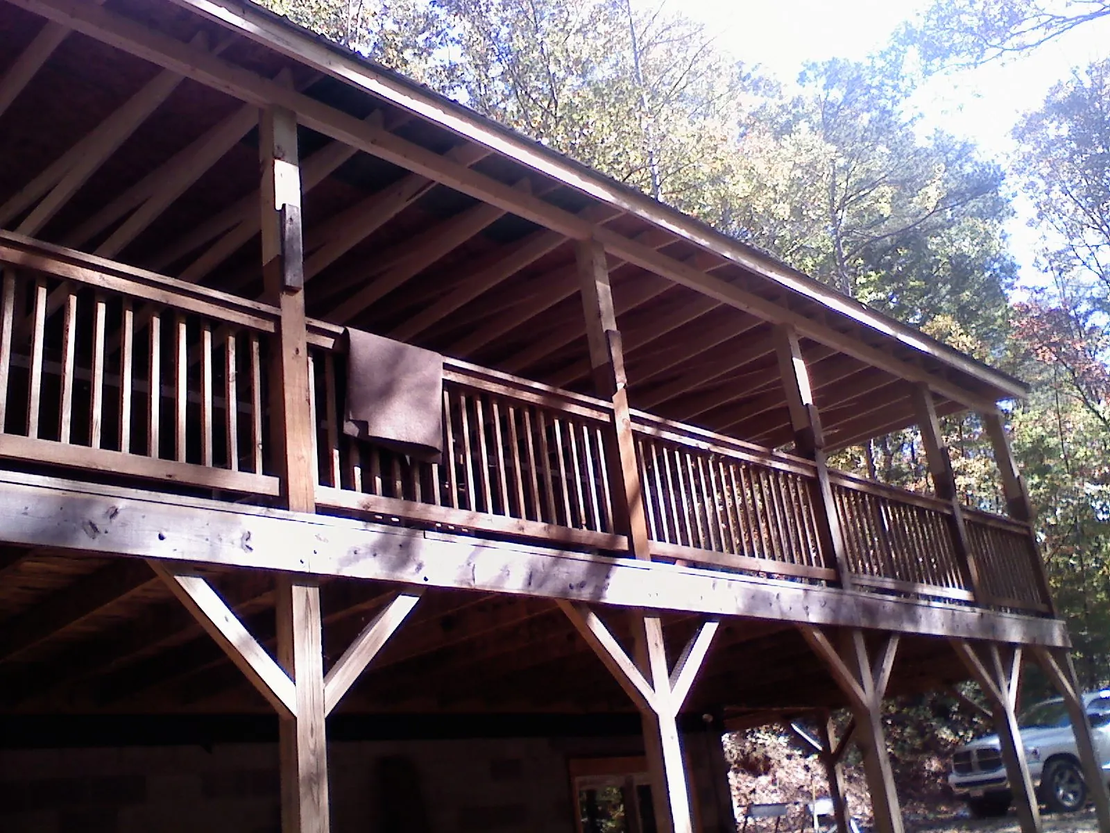 Timber framing under a new elevated porch and deck — Roof Leak Repair in Waskom by Roofing Brothers